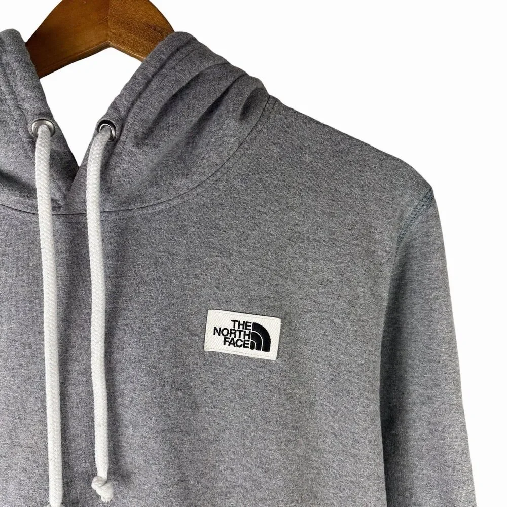 The North Face Gray Pullover Hoodie with White Drawstrings